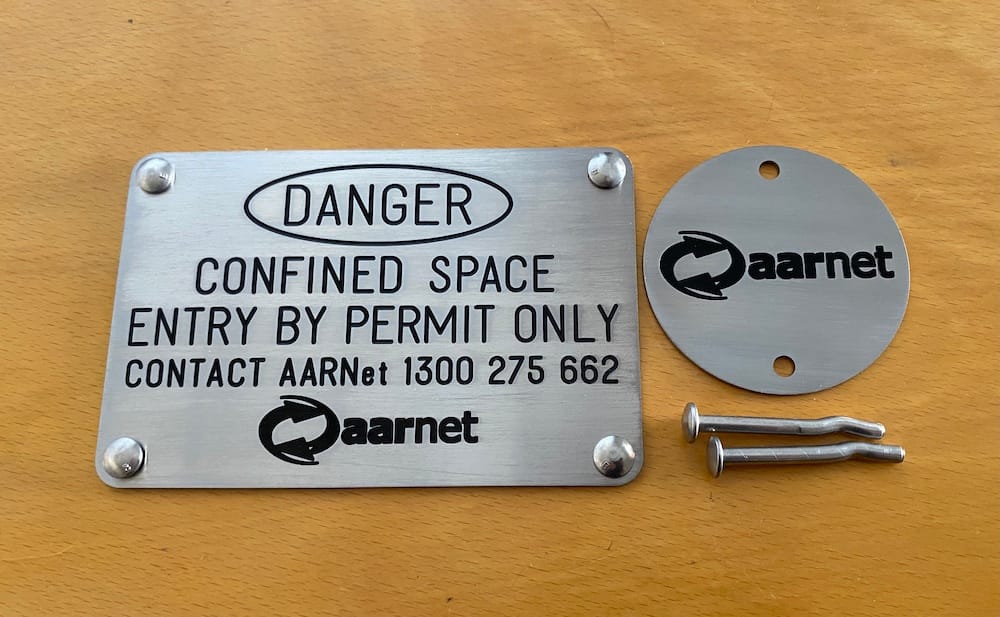 Custom Aarnet Stainless Steal Plate with Black Paint Fill